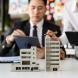 Des professionnels de l'immobilier qui travaillent sur des projets de copropriété